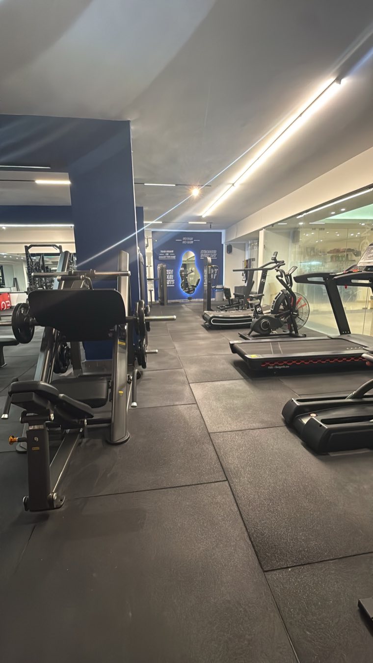 Wide view of the training area with machines and cardio